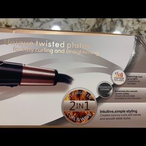 Brand new in box hair straightener/curler
